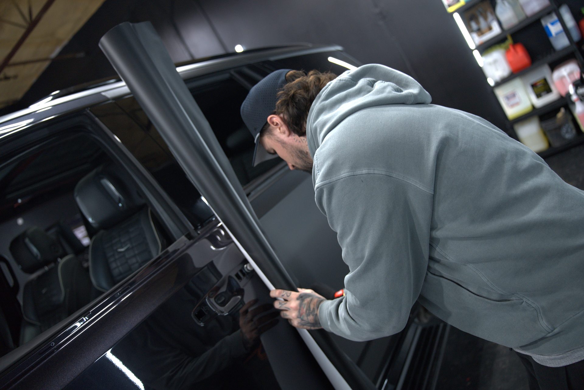 PPF installer working on a vehicle at Jekyll and Hyde's