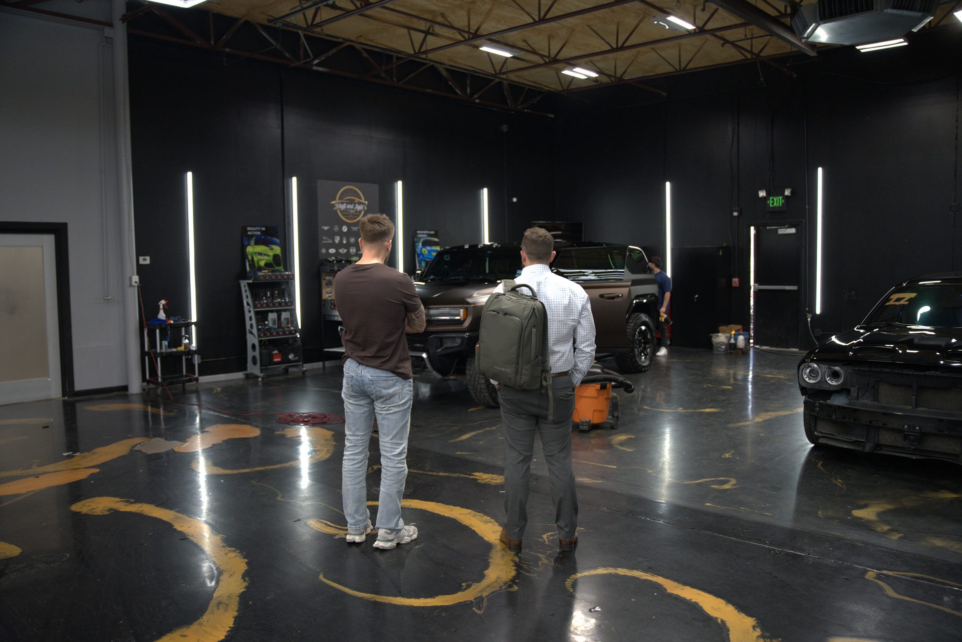 Jekyll and Hyde's team reviewing a job on the shop floor